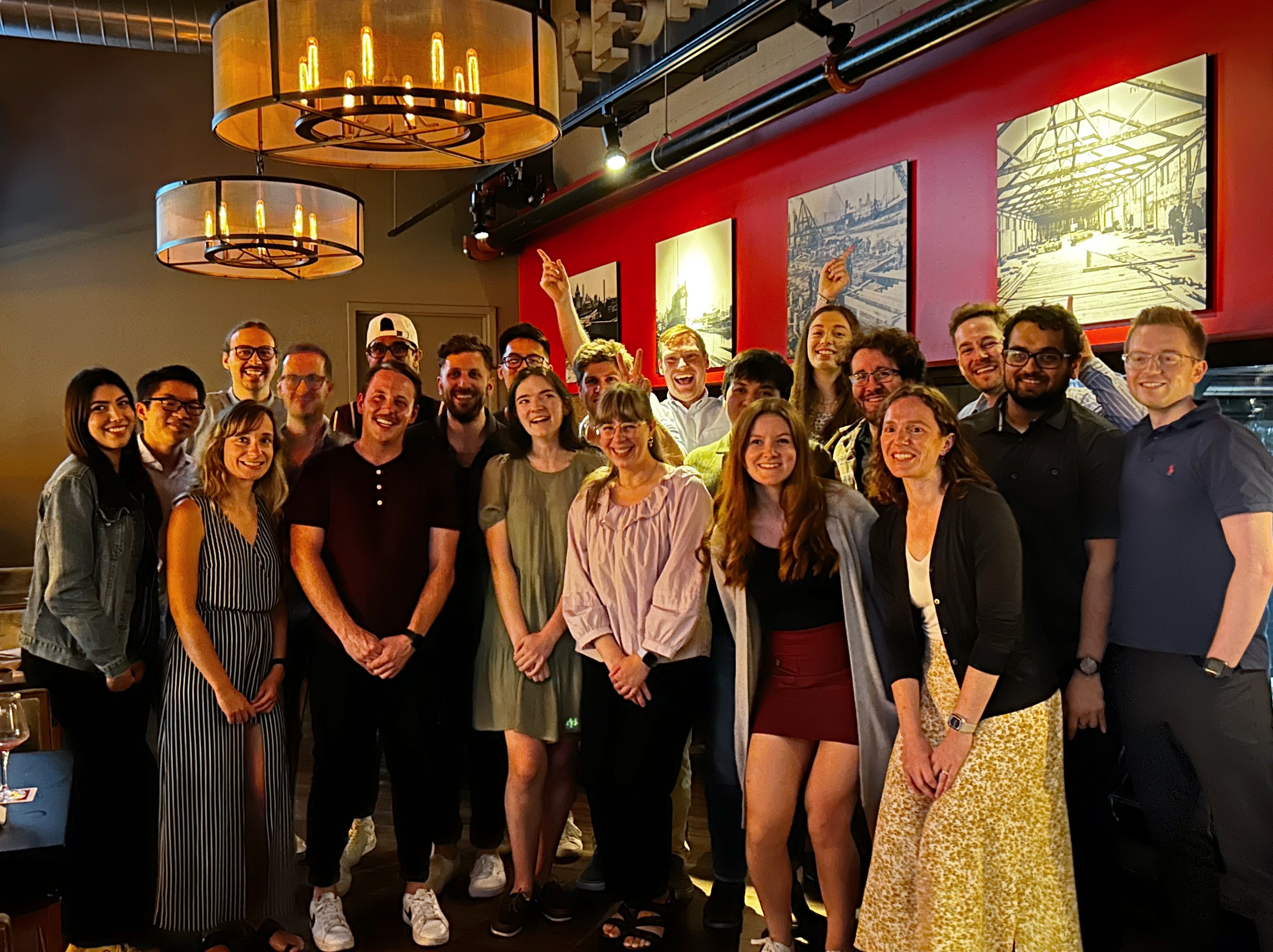 Past and present group members gather for a group photo at Sophie's tenure party.