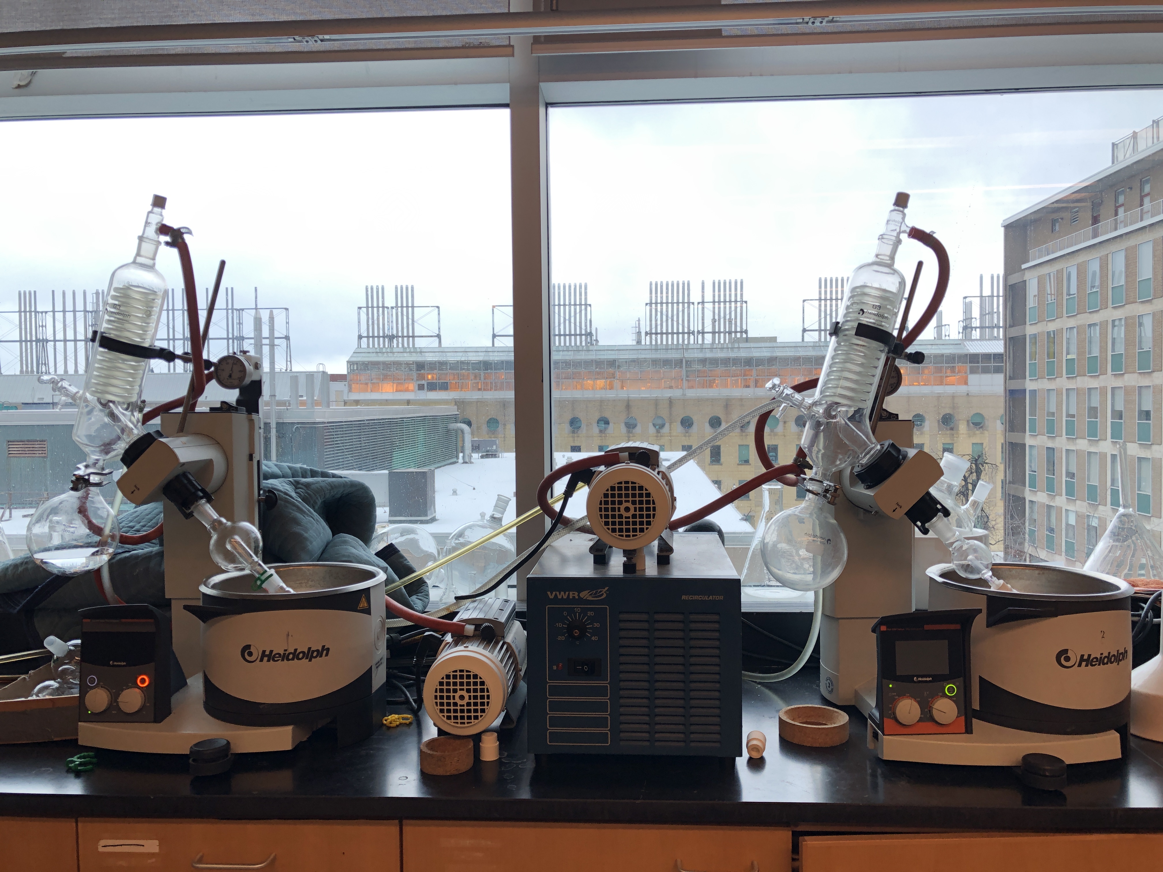 Two Heidolph rotovaps in lab space 473 sitting on a benchtop in front of a window